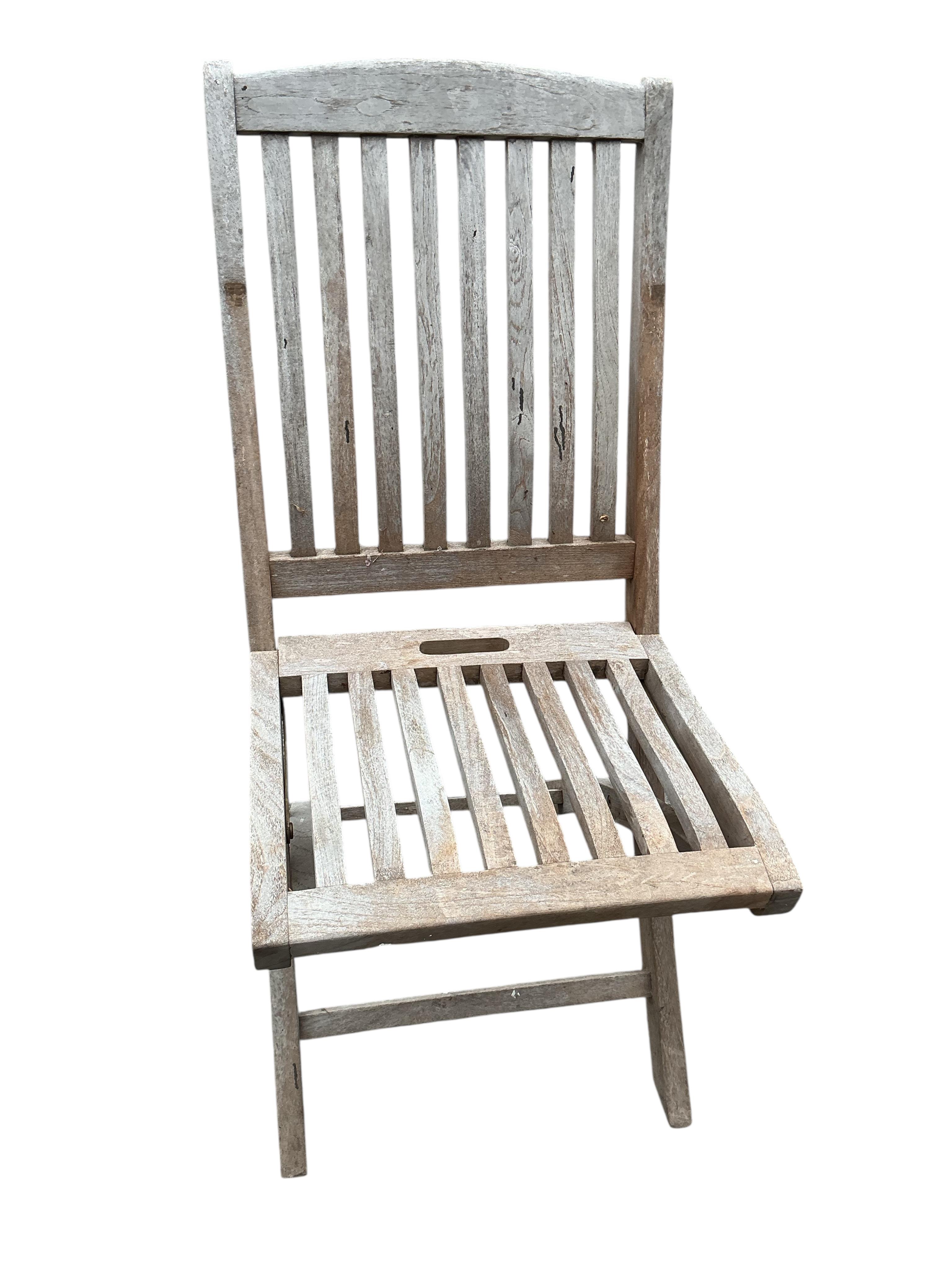 A rectangular weathered teak garden table, width 178cm, depth 90cm, height 72cm together with six Lindsey teak folding garden chairs